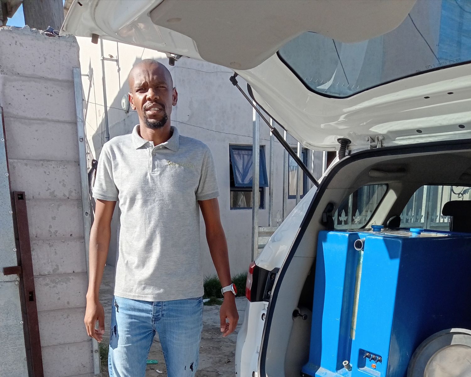 Caretouch Cleaning Co. technician performing mobile carpet cleaning in a Cape Town home